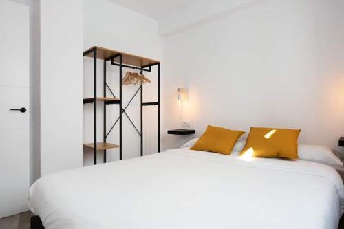 Ένα ή περισσότερα κρεβάτια σε δωμάτιο στο Apartamentos Vexèr