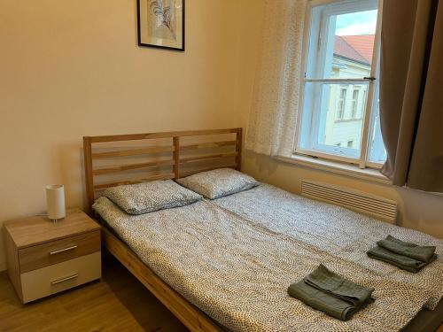 Postel nebo postele na pokoji v ubytování Nice apartment in the city center!