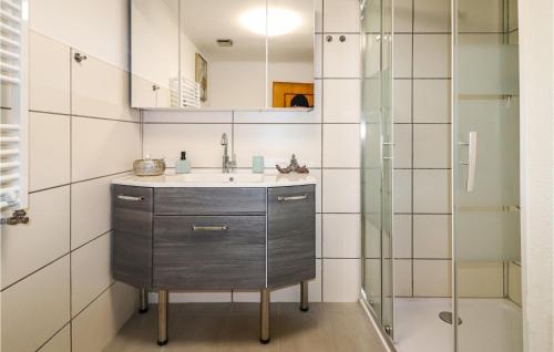 a bathroom with a sink and a shower at 3 Bedroom Pet Friendly Home In Rechnitz in Rechnitz