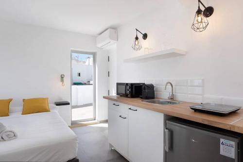 Η κουζίνα ή μικρή κουζίνα στο Apartamentos Vexèr