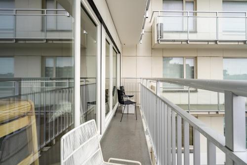 Ein Balkon oder eine Terrasse in der Unterkunft Duin én zeezicht te Zeedijk Oostduinkerke
