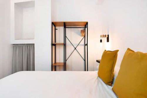 Ένα ή περισσότερα κρεβάτια σε δωμάτιο στο Apartamentos Vexèr