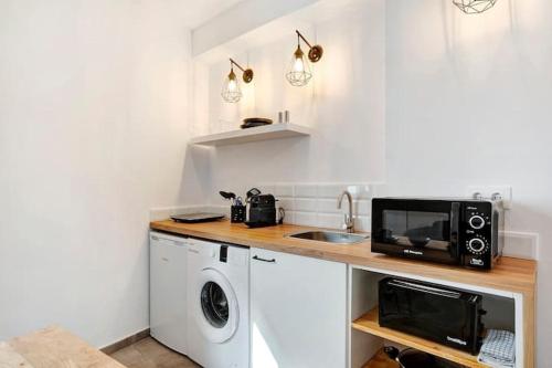 Η κουζίνα ή μικρή κουζίνα στο Apartamentos Vexèr