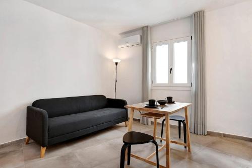 Χώρος καθιστικού στο Apartamentos Vexèr