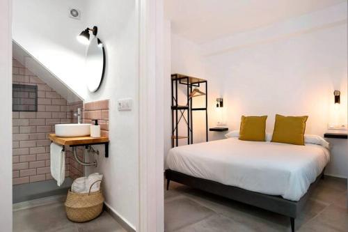 Ένα ή περισσότερα κρεβάτια σε δωμάτιο στο Apartamentos Vexèr