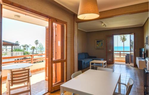 A balcony or terrace at Amazing Apartment In Marina Di Ragusa