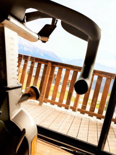 a view of a balcony with a view of the ocean at Chalet Hôtel Les Blancs in Pra-Loup