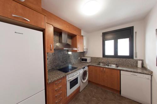 Kuchyňa alebo kuchynka v ubytovaní Apartament Bisaura de Ter