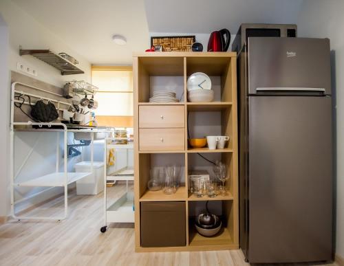 Kuchyň nebo kuchyňský kout v ubytování Cosy 2-room apartment near the city centre