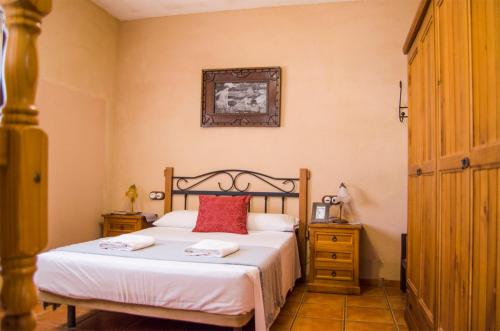 Postel nebo postele na pokoji v ubytování Casas Rurales Alhambra - Lagunas de Ruidera