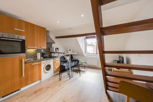 Η κουζίνα ή μικρή κουζίνα στο Duplex Vue Montagne - ideally located with its view