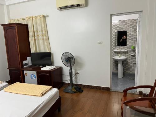 Bilik mandi di Anh Đào Hotel