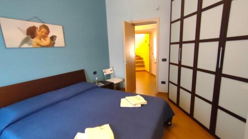 Postel nebo postele na pokoji v ubytování CASA SOPRANO da Anita