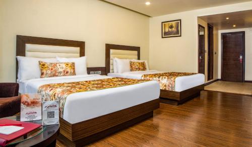 Katil atau katil-katil dalam bilik di Summit Montana Suites & Spa at Mall