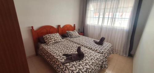 Postel nebo postele na pokoji v ubytování Apartamento El Cercado Mogan
