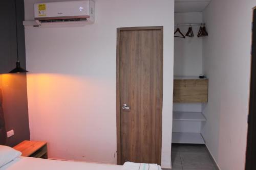 Una cama o camas en una habitación de Hotel Almalu