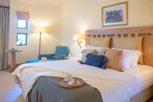 En eller flere senge i et værelse på Giannoulis - Santa Marina Plaza (Adults Only)