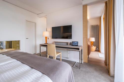 TV o dispositivi per l'intrattenimento presso BUDERSAND Hotel - Golf & Spa - Sylt