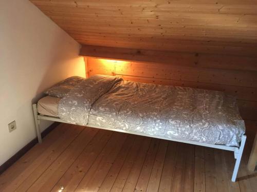 Postel nebo postele na pokoji v ubytování Les mésanges