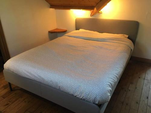 Postel nebo postele na pokoji v ubytování Les mésanges