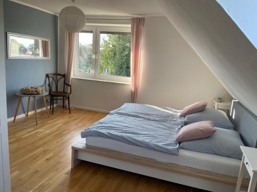 Postel nebo postele na pokoji v ubytování Ferienhaus Storchennest