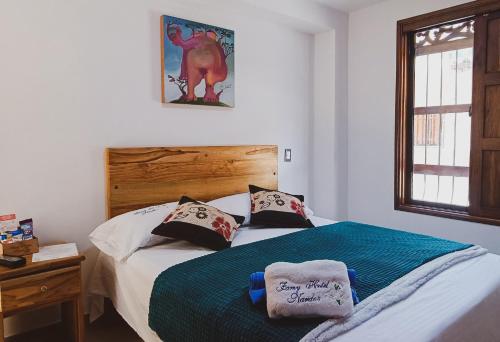 Postel nebo postele na pokoji v ubytování Famy Hostal Nardo's