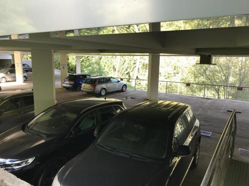 a group of cars parked in a parking lot at La Casa Shabby in Marilleva