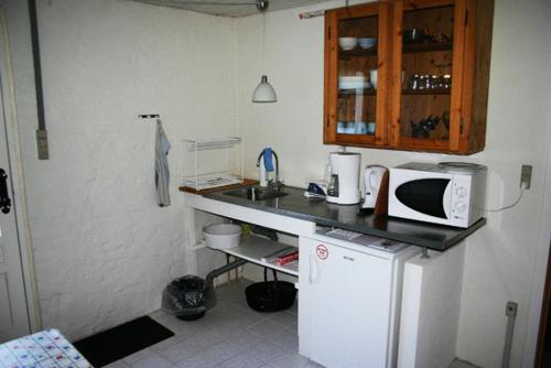 Una cocina o cocineta en Holmehuset Bed & Breakfast