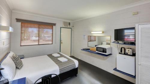 Ένα ή περισσότερα κρεβάτια σε δωμάτιο στο Castlereagh Lodge Motel