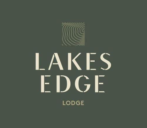 a logo for lakes edge lodge at Lakes Edge Lodge in Lake Tekapo