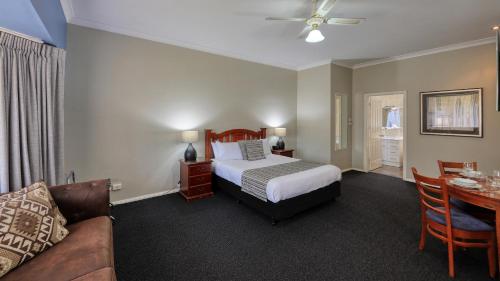 Ένα ή περισσότερα κρεβάτια σε δωμάτιο στο Castlereagh Lodge Motel