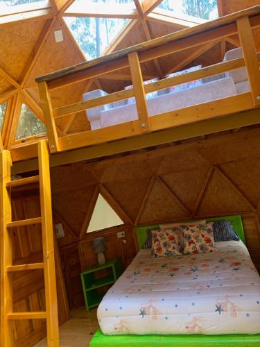 Rúm í herbergi á Domosup3rlopez - Glamping Petfriendly con Jacuzzi en Boyacá