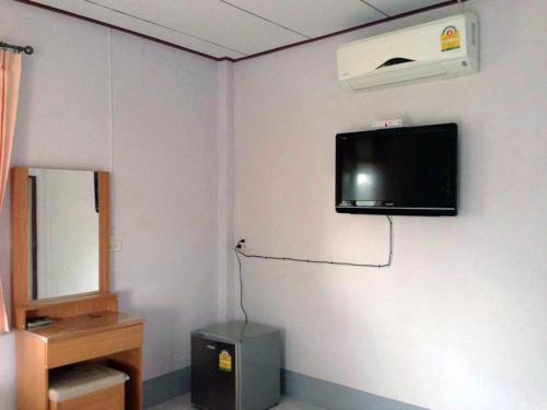 Televízia a/alebo spoločenská miestnosť v ubytovaní Chuanchom Resort