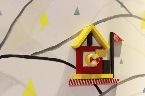 a painting of a bird house on a tree branch at 禾裕 北車 Hey!U in Taipei