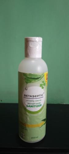 a bottle of agriculture fertilizers sitting on a table at Queen Palace guest house in Srinagar