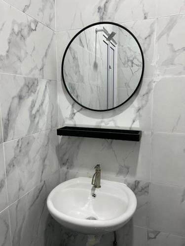 Ένα μπάνιο στο Homestay SJTM