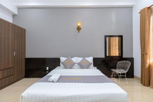 Giường trong phòng chung tại Palm Villa 37 Luxury 6 phòng ngủ 8 wc Vũng Tàu