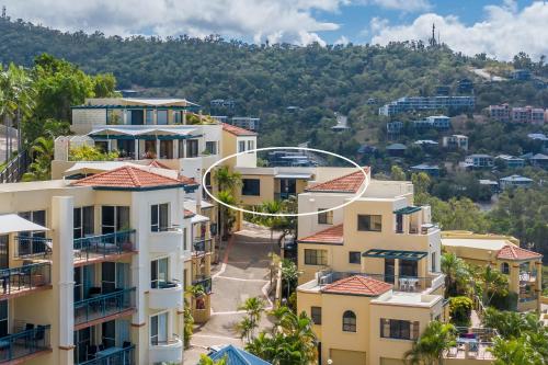 an aerial view of houses in a city at Mediterranean Escape in Airlie Beach