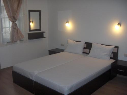 Кровать или кровати в номере Krasteva House