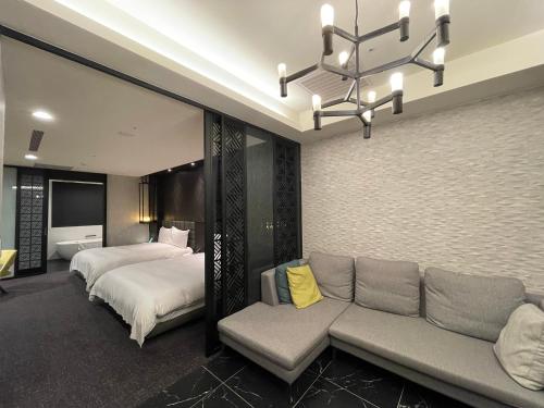 Cama o camas de una habitación en Hotel Château Anping
