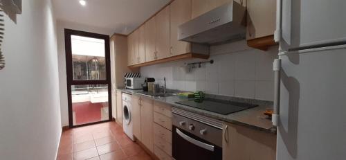 A kitchen or kitchenette at Canteras Home
