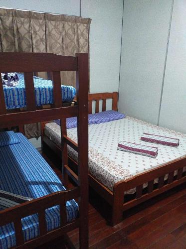 Discovery Youth Hostel Malaccaにあるベッド