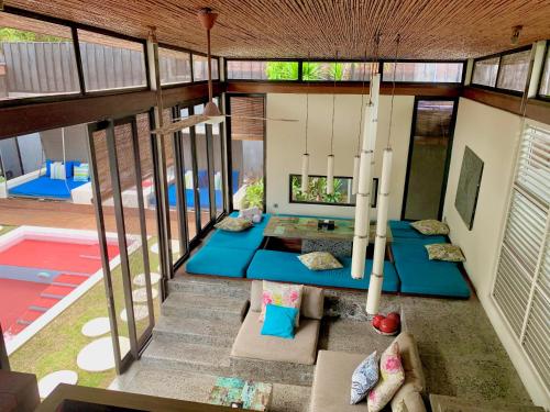 an open floor plan of a house with a living room at Kiss Bali Villas in Seminyak