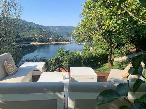 a view of a river from the balcony of a house at Cottage da Minha Terra 1890 in Geres