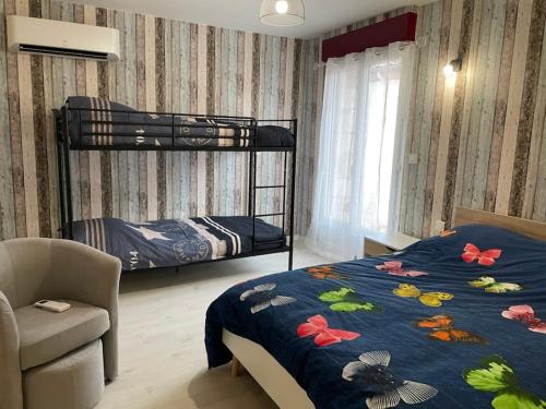 Postel nebo postele na pokoji v ubytování Les Meublés de Lassou Gîte