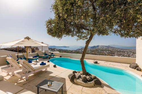 a villa with a swimming pool and a tree at Zannos Melathron in Pyrgos