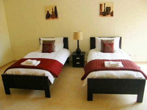 Luxury two BR pool view beach side apartment at Algarve's longest beach