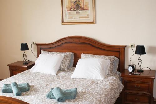 Postel nebo postele na pokoji v ubytování APARTMAN FLAVIA