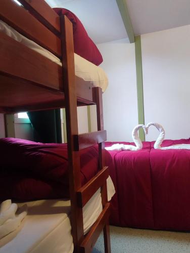 a bedroom with a bunk bed and a bunk bed at Camping Costa Blanca in El Campello