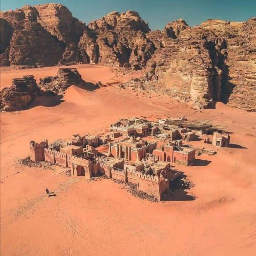 a village in the middle of the desert at Scarlet Luxury Camp Wadi Rum in Wadi Rum